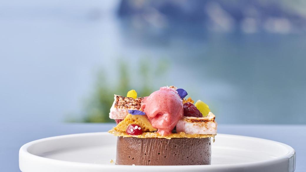 A dessert at the Sandy Cove Hotel with a view of the bay behind