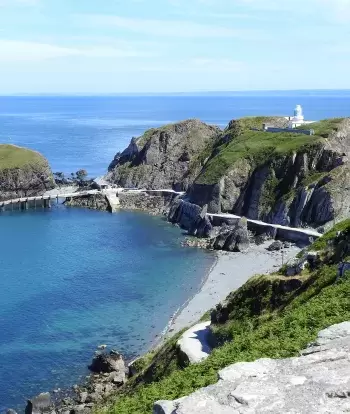 The south lighthouse and jetty on Lundy Island off the North Devon coast