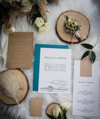 Invitations and decorations for a winter wedding at The Venue, Sandy Cove Hotel