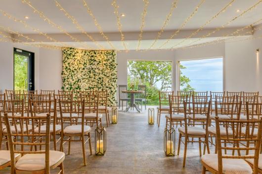 Chairs lining the Seascape Ceremony Room at The Venue, Sandy Cove